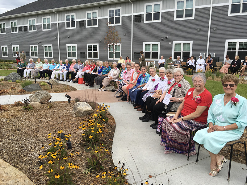 A group of Franciscan Sisters celebrate the dedication of Garden View Grotto